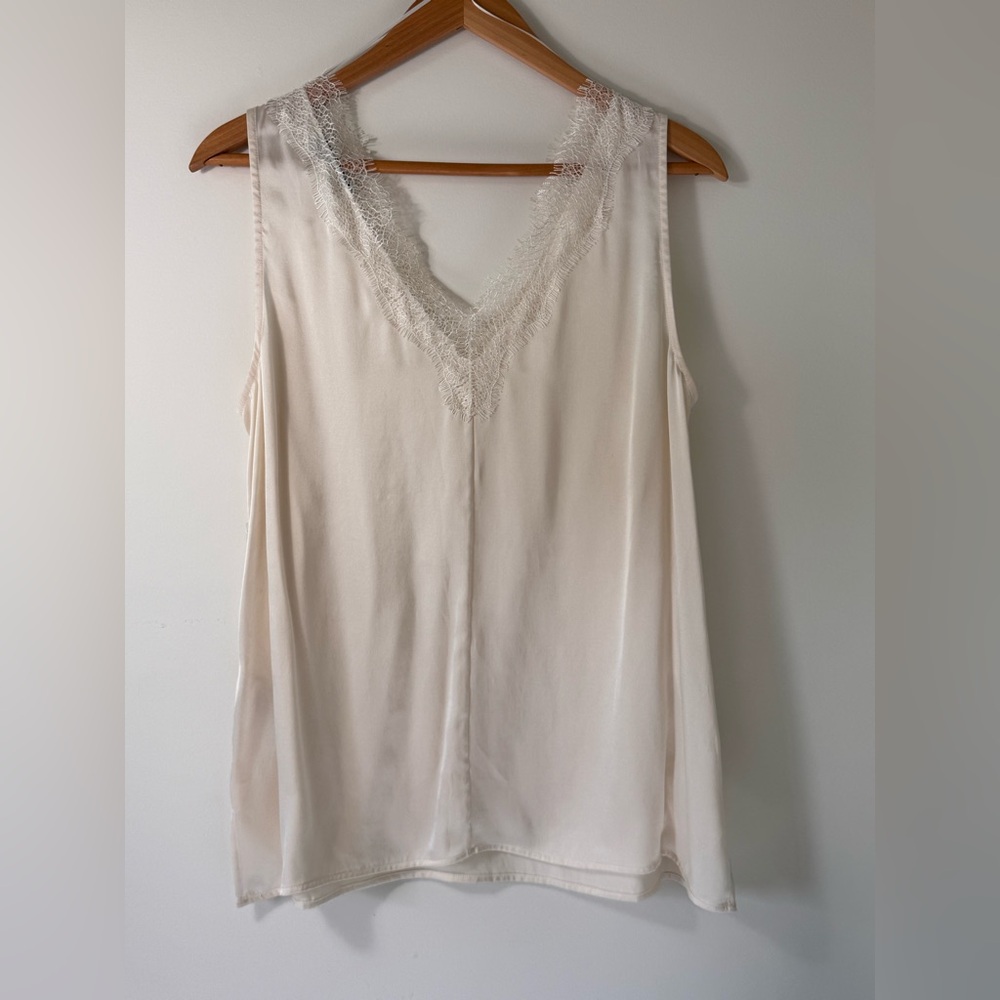 Silky camisole style top with lace trim
